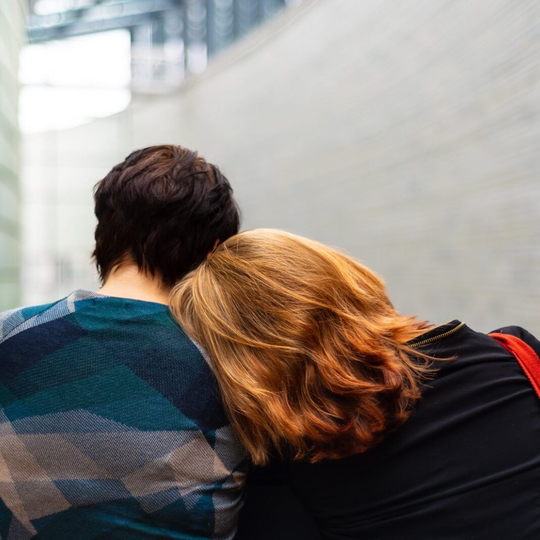 substance-header two people comforting each other